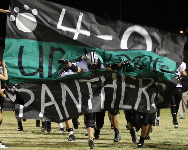 Palo Verde defensive lineman Jared Olsen leads the pack through ...