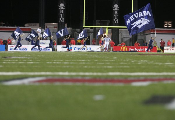 UNR cheerleaders celebrate a first-half touchdown against UNLV.