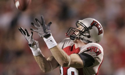 UNLV wide receiver Ryan Wolfe pulls in a catch that he ran into the end zone, only to have the play nullified by a holding penalty in the first half.