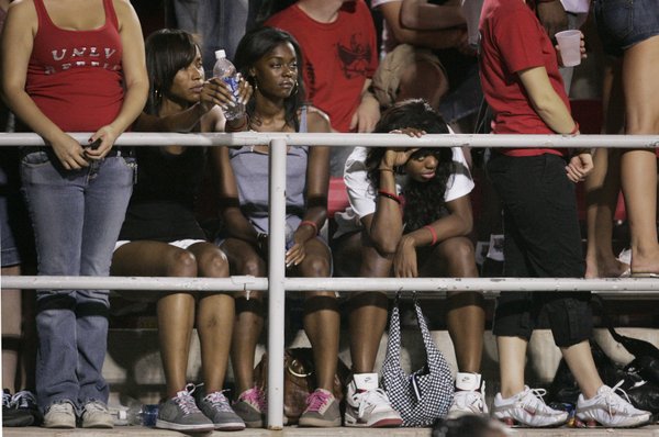 UNLV fans watch the closing minutes of the game against ...