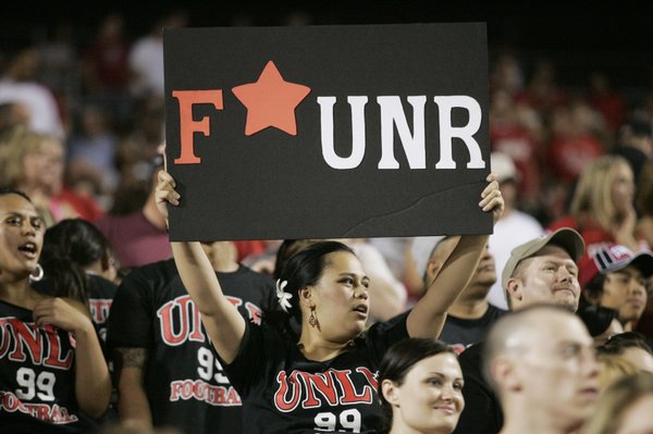 A UNLV fan displays her sentiments during the start of ...