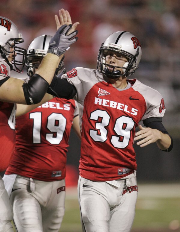 UNLV kicker Ben Jaekle is congratulated after connecting with a ...