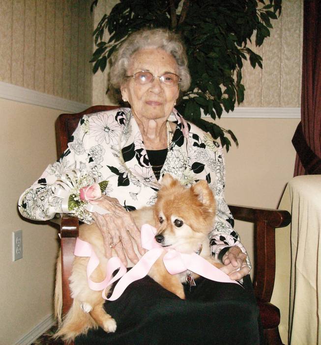 Lucille Salter, 103, with her dog Princess, was honored at Presitge Assisted Living in Henderson Sept. 22, National Centenarians Day. Salter was born June 27, 1905.