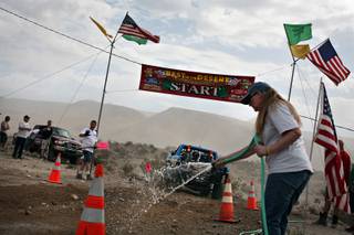 Under cloudy skies, the race start is watered down as racers start 30 seconds apart in the Bilek Racing Silver State 300 near Alamo, Nev., on Saturday, Sept. 27.