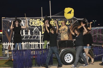 The freshman class of 2012 cooks up a brew while riding in the Silverado homecoming float parade before Friday's varsity game against Coronado. The freshman float won first place in the float contest.
