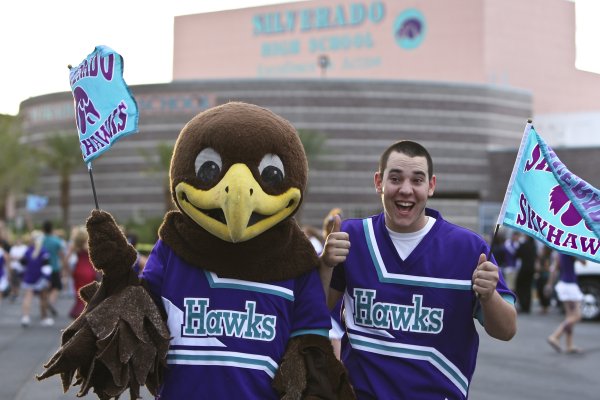 Ryan Rodriguez, right, a senior at Silverado High School, gives ...