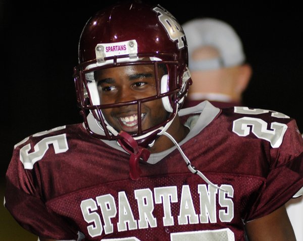 Spartans running back Stephen Nixon enjoys a laugh with a ...