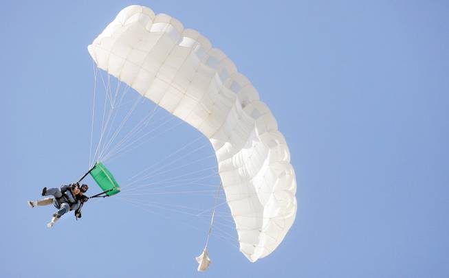 Skydivers free fall during a trip with Skydive Las Vegas at Boulder City Airport Sept. 20.  