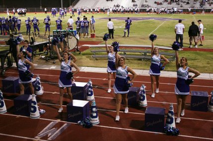 Silverado cheerleaders excite the crowd at Friday's homecoming game against Coronado. 
