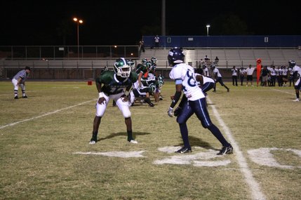 The Gators defense lines up against the Pioneers during Friday's game. The Gators defeated the Pioneers, 21-20.