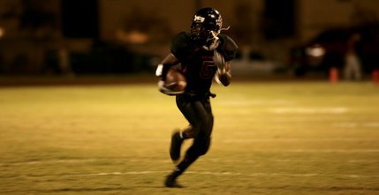 Reggie Bullock, the Wildcats starting senior running back, is all alone as he heads in for a touchdown.