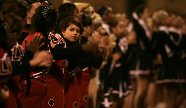 Las Vegas High cheerleaders root for the Wildcats Friday night.