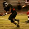 Las Vegas High's Reggie Bullock runs in his second touchdown of the night against Valley on Oct. 3. Despite posting some of the best rushing statistics in the state, Bullock will not head to a Division I program because of academic problems.