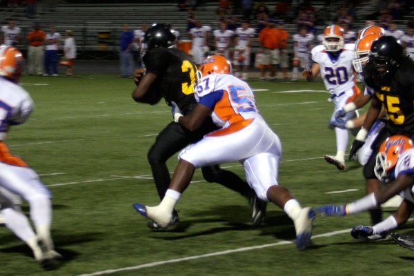 Bishop Gorman's Jalen Grimble (57) takes down Clark's Keneal Riley ...