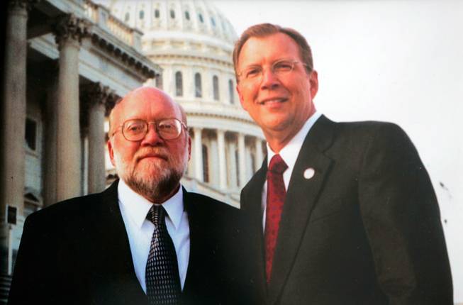 U.S. Rep. Jon Porter of Henderson, right, poses with his brother Kent at the Capitol during the Republican congressman's inauguration in 2003.  