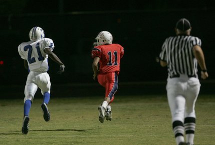 Liberty's Shawn Murray (11) breaks away for a touchdown during Friday's home game against Basic.