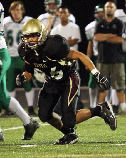 Faith Lutheran linebacker Christian Lopez runs toward an opponent during a game against Virgin Valley on Oct. 3.