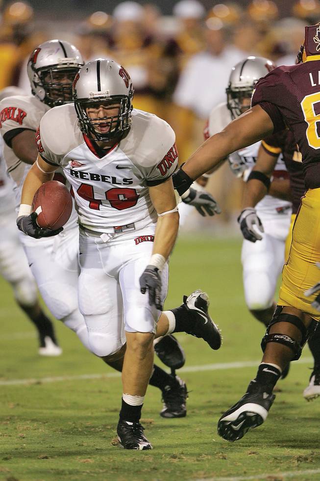 Beau Orth, a 2008 Bishop Gorman grad, returns an interception during a 23-20 UNLV win at Arizona State on Sept. 13 in Tempe, Ariz. Orth, who originally was going to grayshirt the 2008 season for the Rebels, has earned his way onto the field and is making significant contributions through six games.