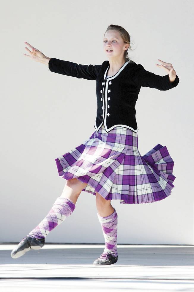 Alexis Brimhall, 14, of the Las Vegas Highland Dance Association, performs a Scottish dance during the ninth annual Something Scottish event at the Rainbow Library. 