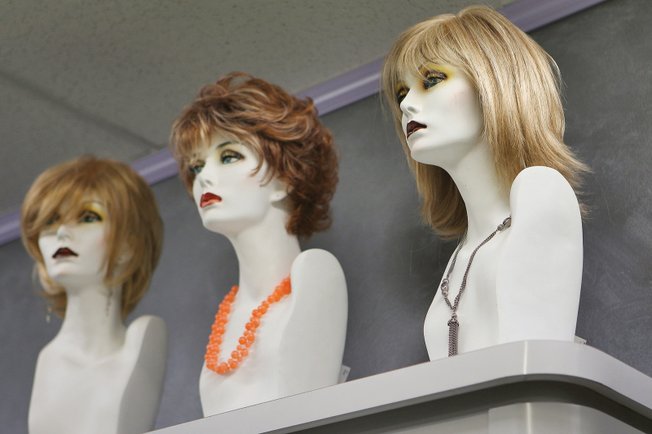 High-quality synthetic hair wigs designed by Raquel Welch and Eva Gabor are delivered to clientele around the valley in the mobile salon "Wigs on the Move." Owner Jane Nelson personally cuts and styles each wig at the homes of customers who are unable to visit conventional hair salons.