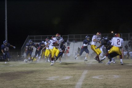  Earnest Hall rushes the ball during Friday night's game against Coronado.