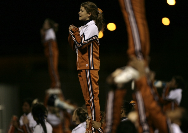 Longhorn cheerleaders try to get the home crowd going on ...
