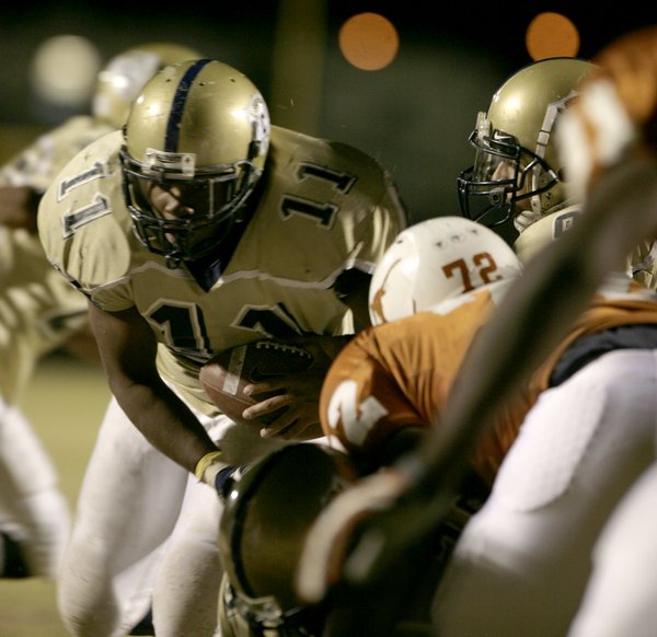 Ronnie Green runs in for a touchdown during Friday night's ...