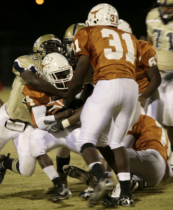 A powerful Cheyenne defense is there to stop Deshae Edwards ...