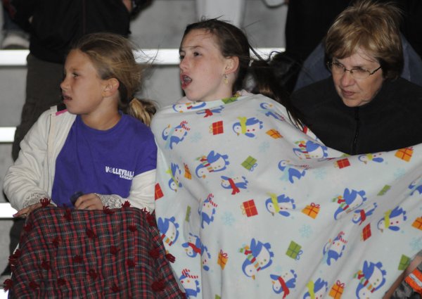 From left, Siara Roberts, Rachel Meservey and Joyce Gardner bundle ...