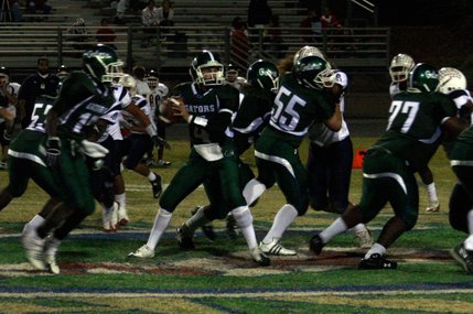 Green Valley quarterback Nick Libonati looks for an opening during Friday's game against Liberty.