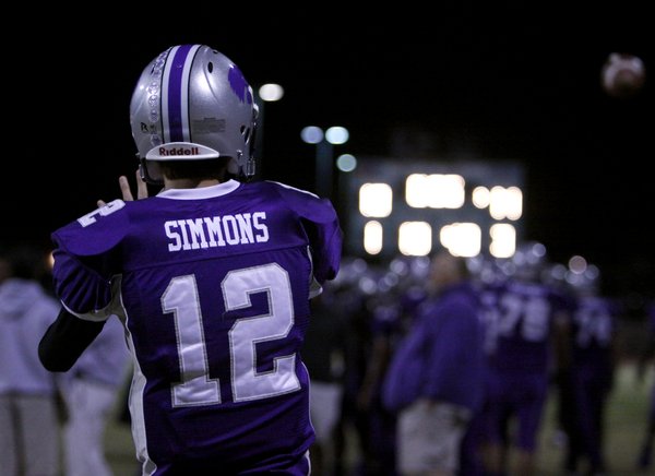 Silverado's Kyle Simmons warms up on the sideline before Friday's ...