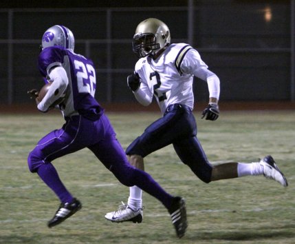 Silverado's Dariouse Gravely, a junior running back, runs from Foothill's Mike Leyba during Friday night's game.