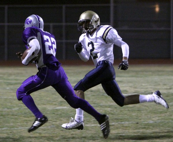 Silverado's Dariouse Gravely, a junior running back, runs from Foothill's ...