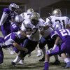 Foothill's Algernon Sewell runs the ball up field against Silverado's defense during Friday's game.