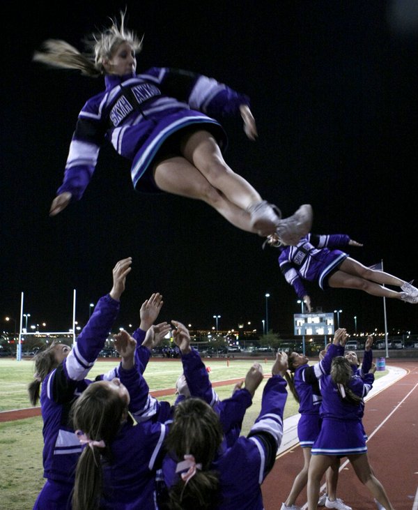 Silverado cheerleaders perform for their home crowd Friday night.