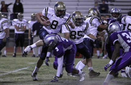 Foothill junior Aaron Dupin is tackled by Silverado's Keenan Graham during Friday's game at Silverado.