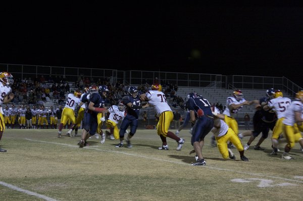 Tyler Tebbs (47) blocks Logan Nester (78) during Friday night's ...