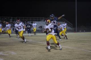 Earnest Hall rushes the ball during Friday night's game against Coronado.