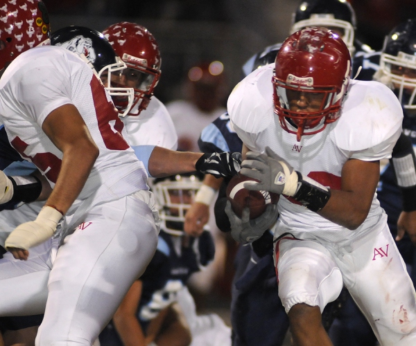 Aggies running back Gabe Tony (32) looks for a seam ...