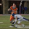 Bishop Gorman defensive end Justin Chaisson (97) barrels over a Sierra Vista player at the Gaels' homecoming game on Oct. 10.
