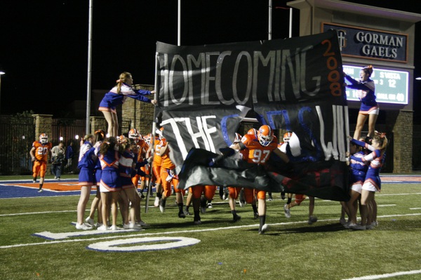 The Gaels make an entrance at the team's homecoming game ...