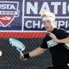 Brandon Parker of Palo Verde chases down a forehand against Brandon Aguilar of Bonanza during the Su