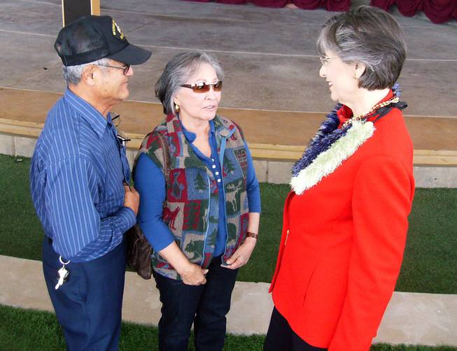 Dick and Jo Takahashi, of Las Vegas, talk to Hawaii Gov. Linda Lingle after a Wednesday speech at the Henderson Events Plaza in support of Republican presidential candidate Sen. John McCain.              