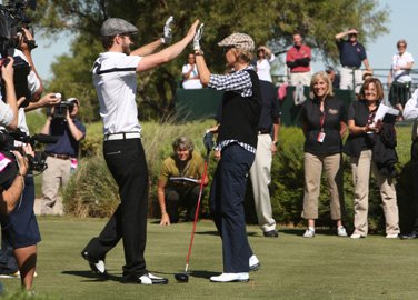 Justin Timberlake, left, congratulates comedian and television host Ellen DeGeneres ...
