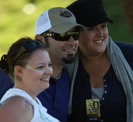 Singer Chris Kirkpatrick, center, poses with fans Tricia Kornegay and Nikole Montez during the Justin Timberlake Shriners Hospitals for Children Open at TPC Summerlin in Las Vegas on October 15, 2008.