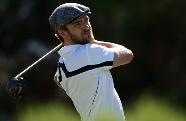 Justin Timberlake watches his drive during the Justin Timberlake Shriners ...
