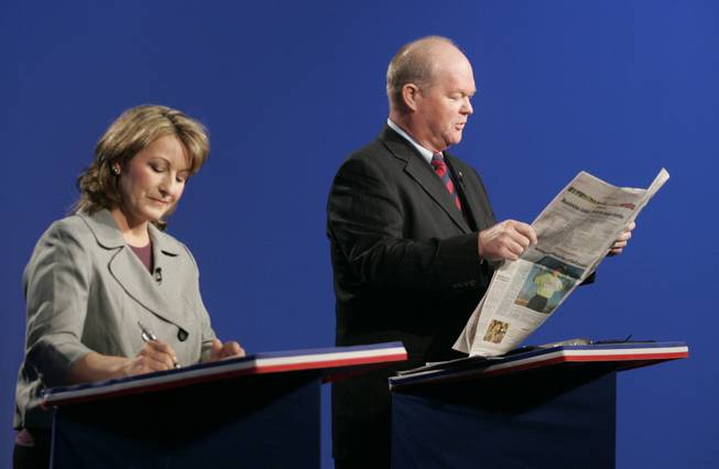 Allison Copening spars with state Sen. Bob Beers in a debate Thursday.