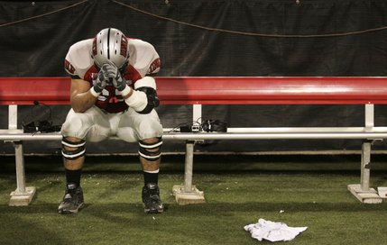 UNLV offensive lineman Mario Jeberaeel sits on the bench after the Rebels were downed by Air Force 29-28 Saturday at Sam Boyd Stadium. 
