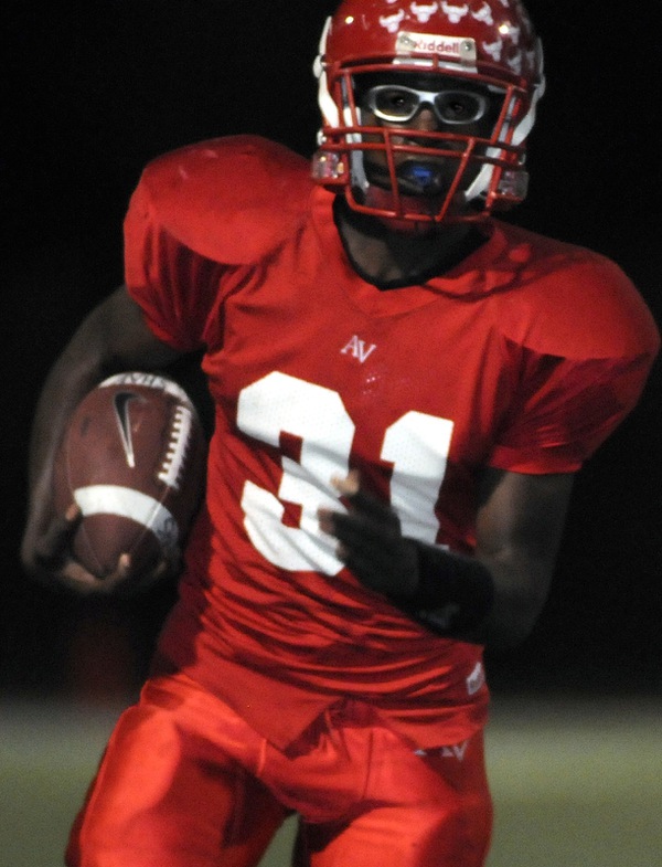 Aggies running back Taylor Wooten runs upfield for a big ...