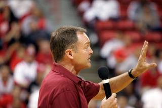 Coach Lon Kruger speaks to the crowd during the UNLV basketball team's first practice at the Thomas & Mack Center on Friday.